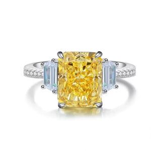 Radiant Cut Yellow Ring with Trapezoid Side Stones, Three-Stone Engagement Ring